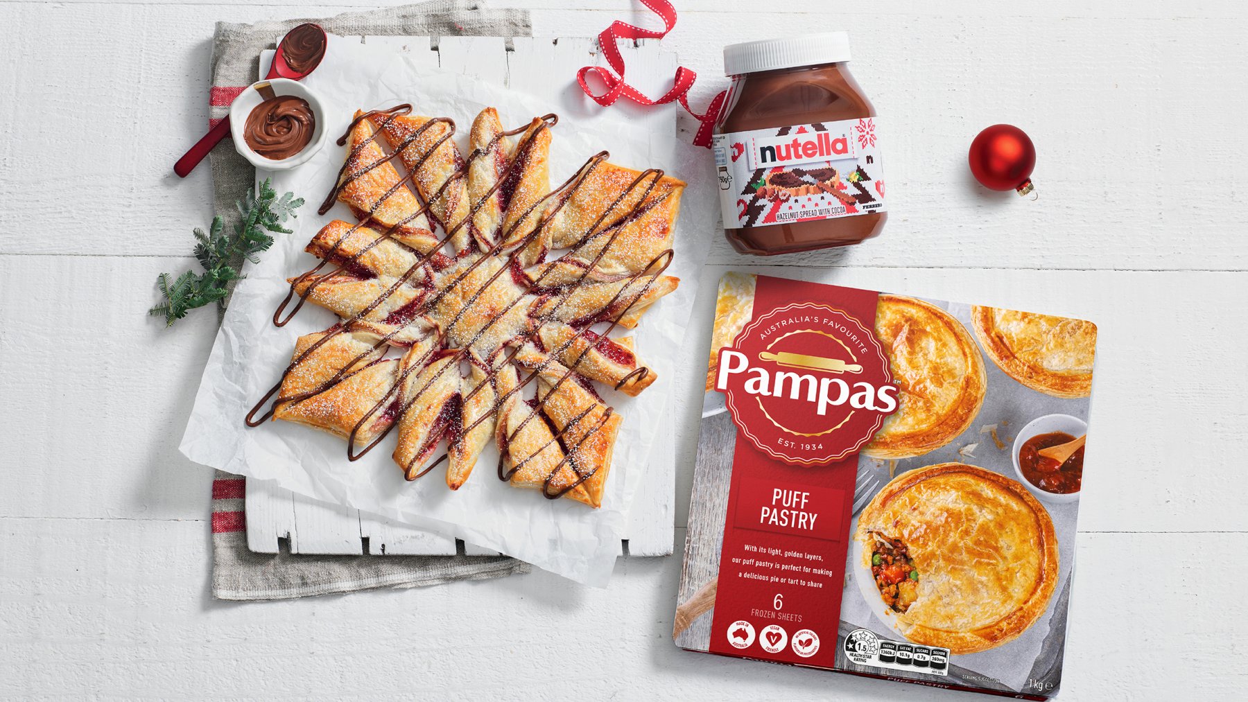 Puff Pastry Snowflake with Raspberry Jam and Nutella Pampas